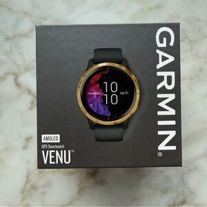 Garmin Venu Smartwatch with Gold and Black Design